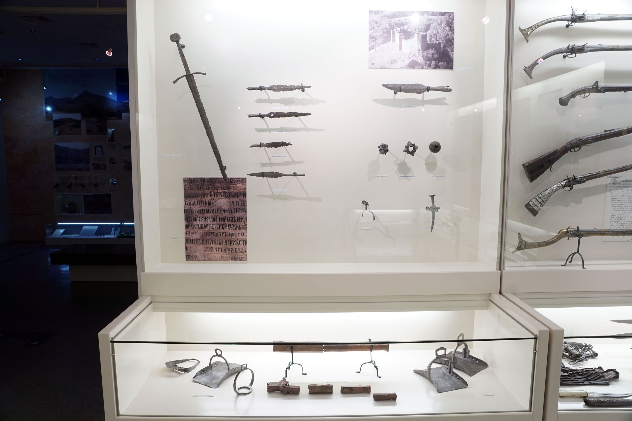 Display case with medieval weapons